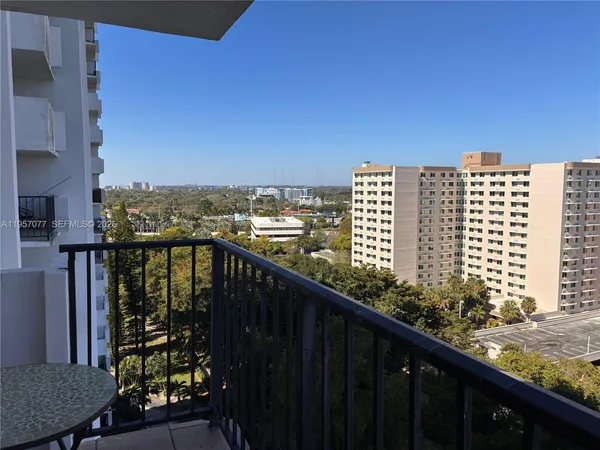a view of a balcony with city view