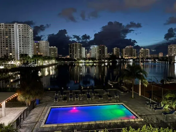 a view of a chairs and table in a patio