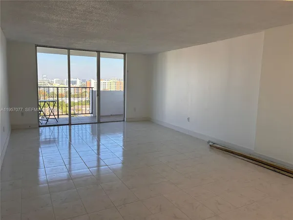 an empty room with sliding door