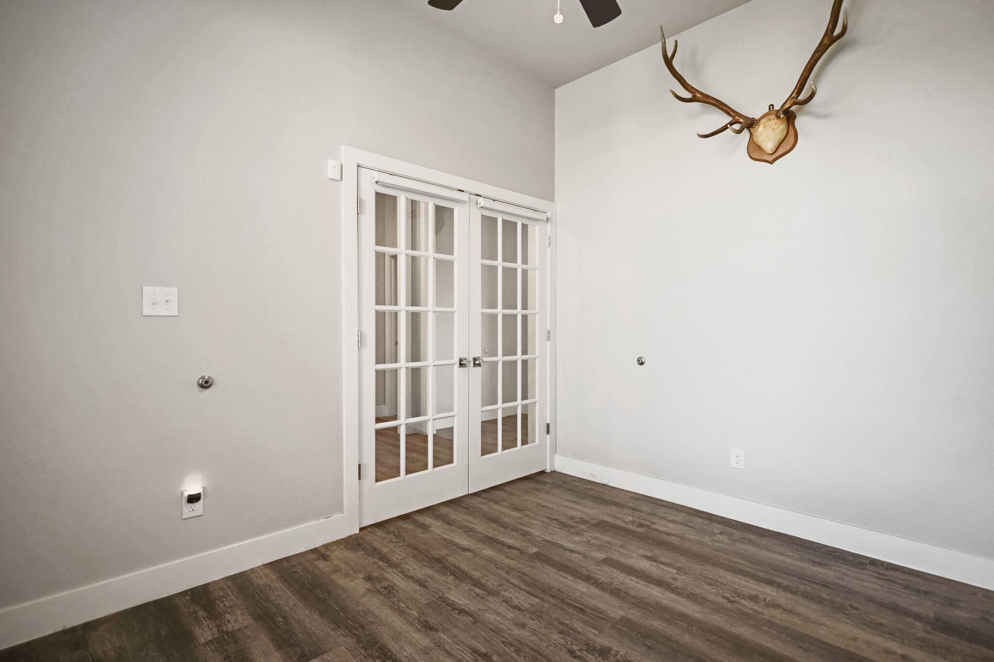 7808 58th Street Lubbock, TX 79407 - Photo 23 of 50 a view of an empty room with a window