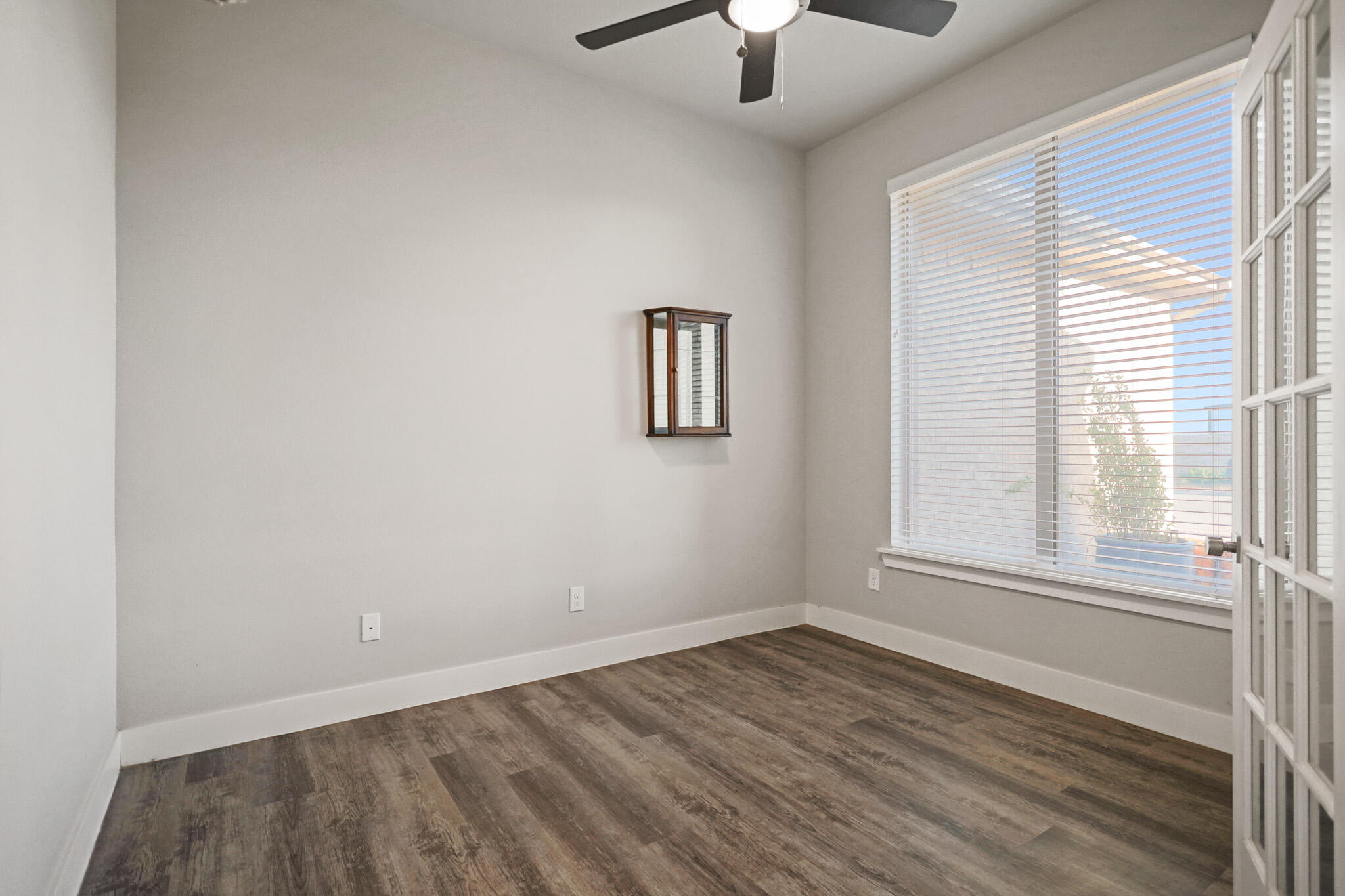 7808 58th Street Lubbock, TX 79407 - Photo 24 of 50 an empty room with a window
