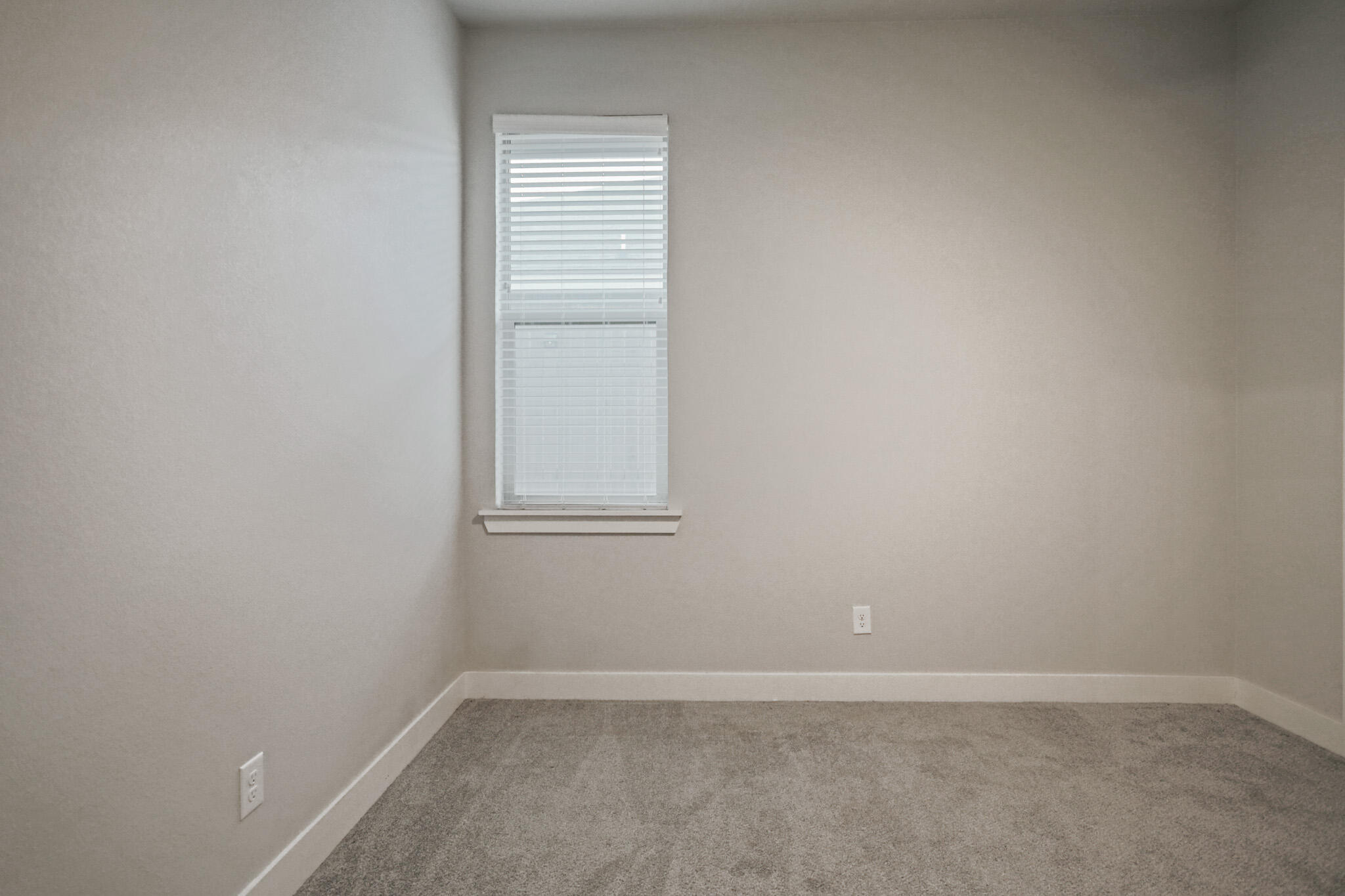 7808 58th Street Lubbock, TX 79407 - Photo 33 of 50 a view of an empty room with a window
