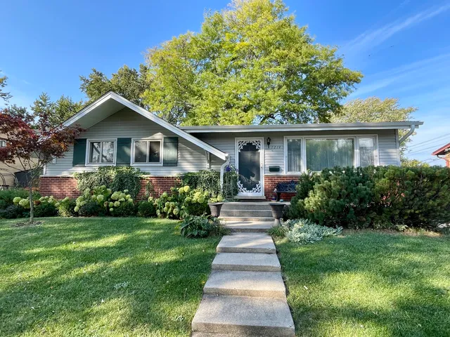 a view of swimming pool with a yard