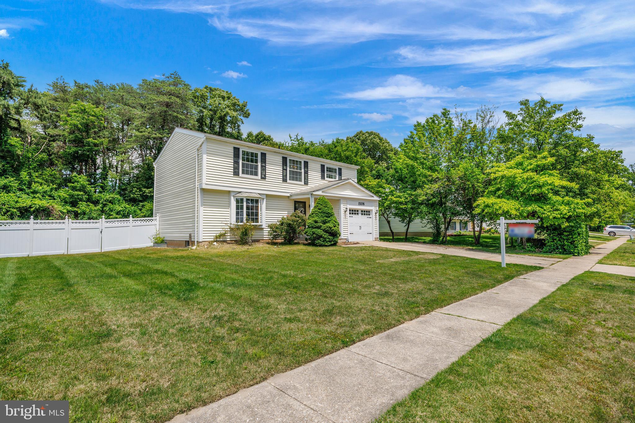 1506 Gollum Road Hanover, MD 21076 - Photo 2 of 44 a front view of a house with a yard
