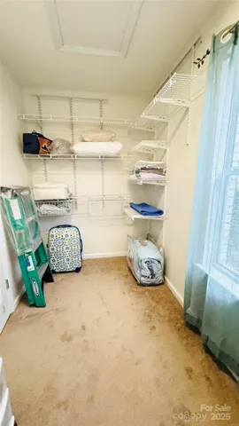 a view of a walk in closet