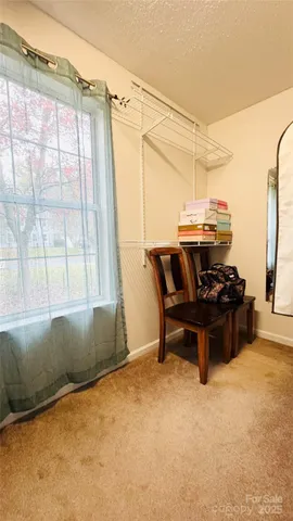 a room with a table and chairs