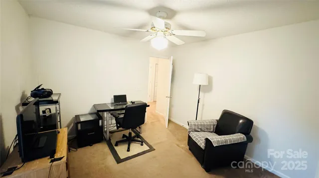 a living room with a rug