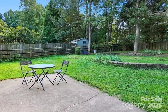 a view of a backyard with a slide