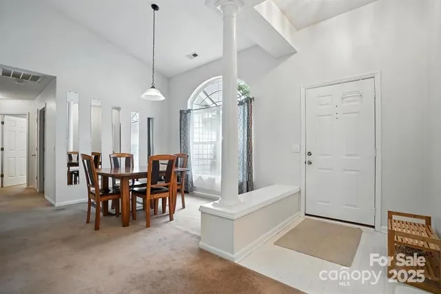 a view of a livingroom with furniture and window