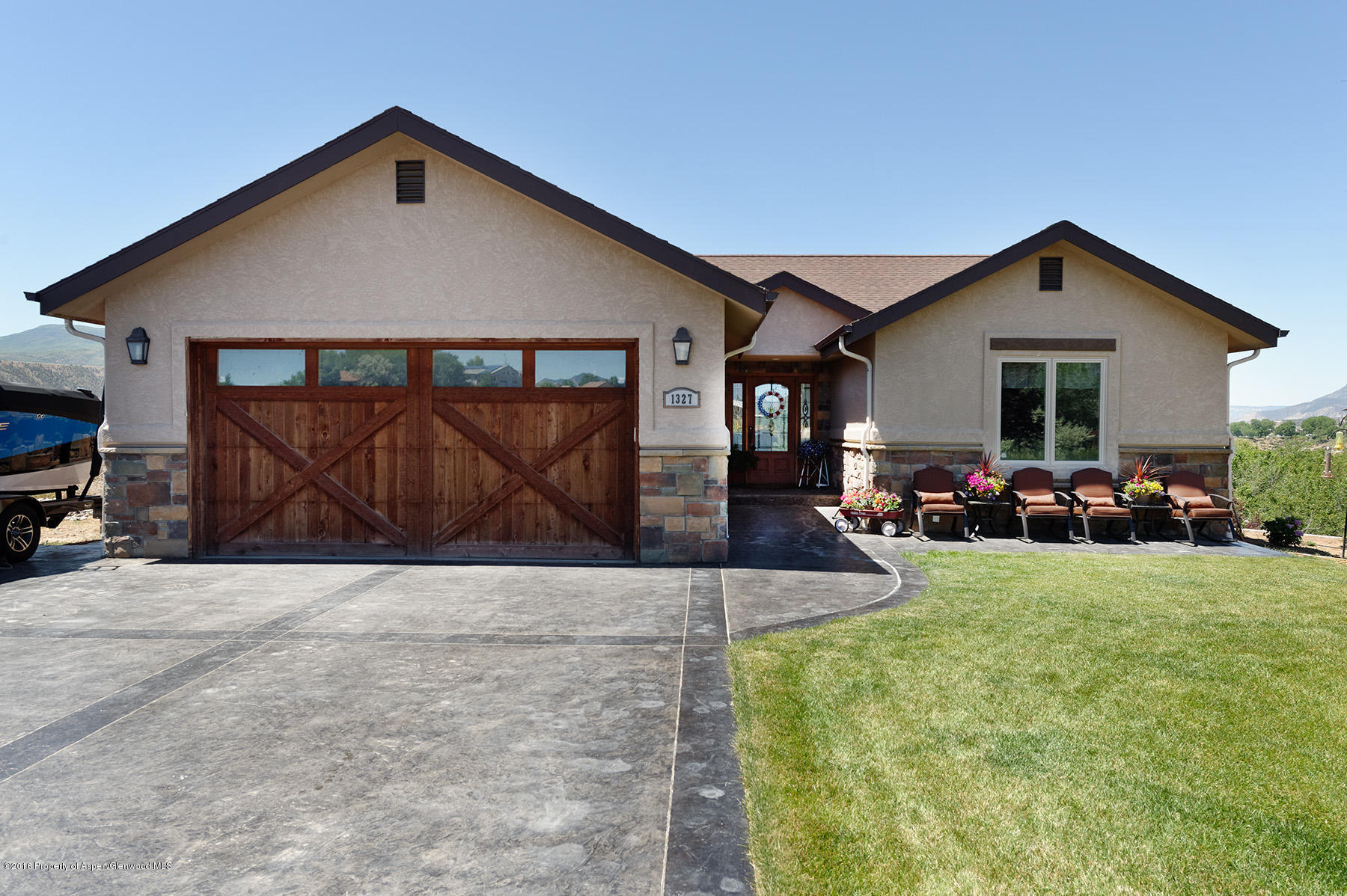 1327 Clover Court Rifle, CO 81650 - Photo 1 of 21 a view of a house with patio