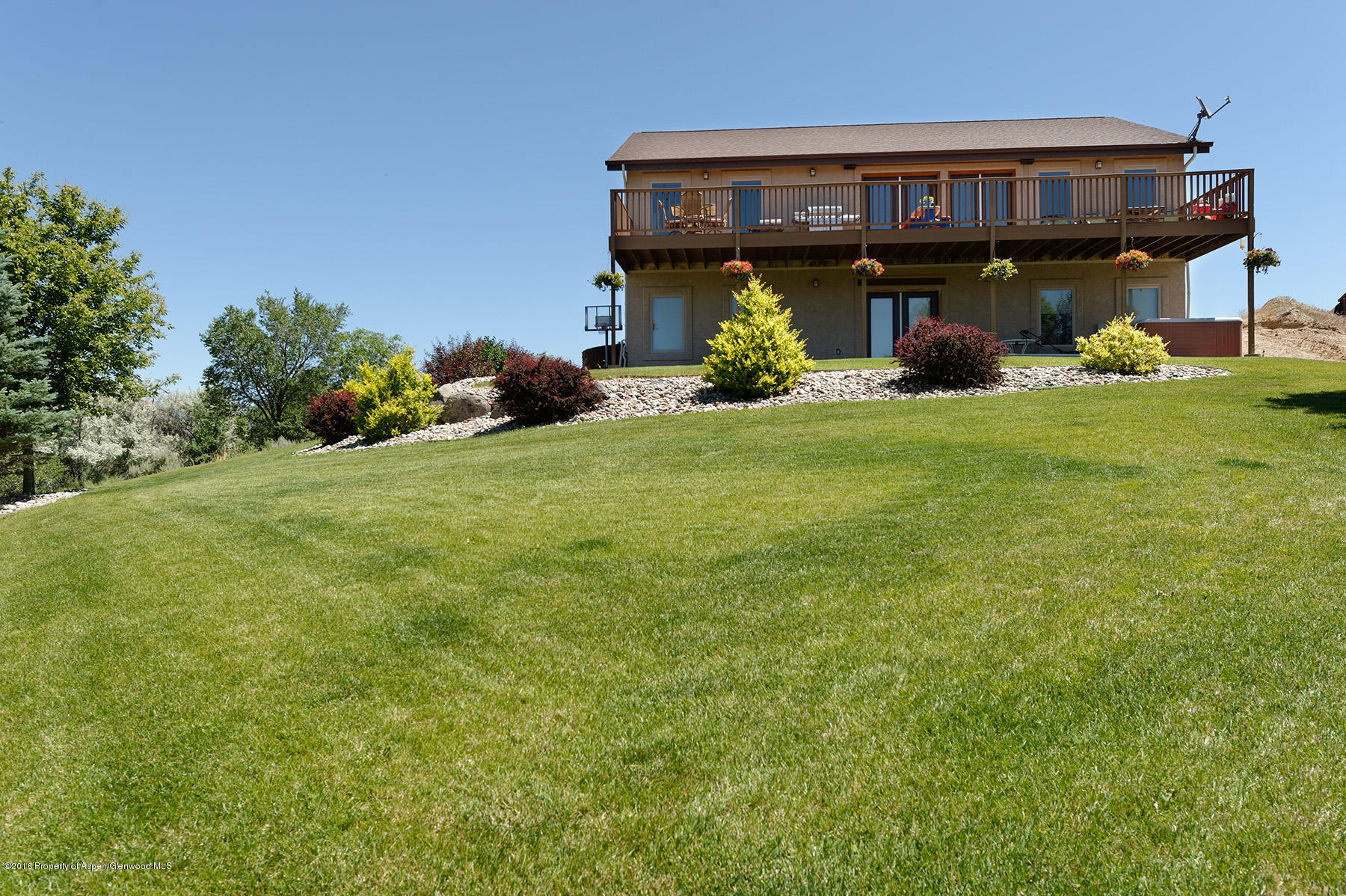 1327 Clover Court Rifle, CO 81650 - Photo 21 of 21 a view of a house with a yard