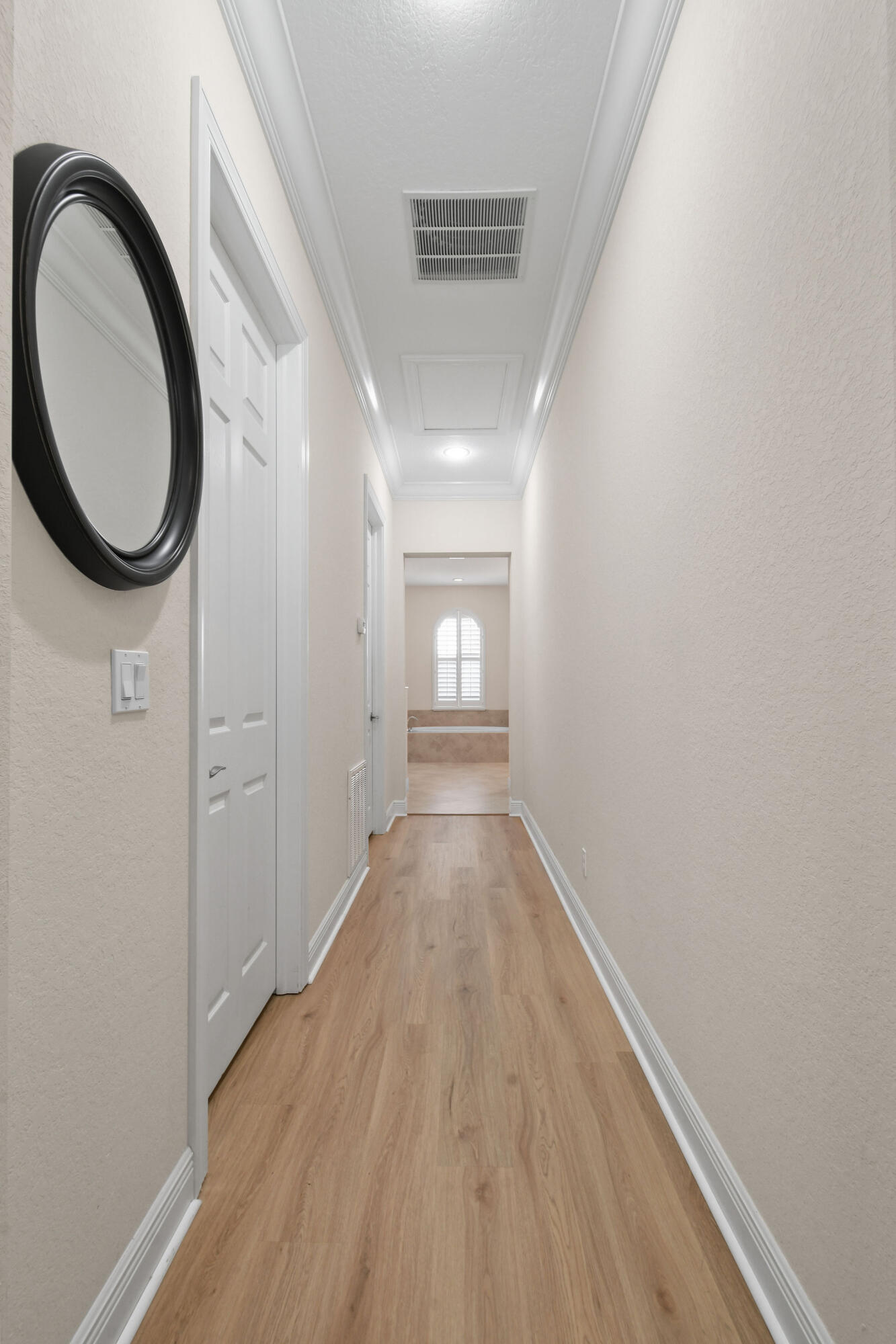 7668 Southeast Laque Circle Stuart, FL 34997 - Photo 23 of 64 Hallway from Master Bedroom to Bath