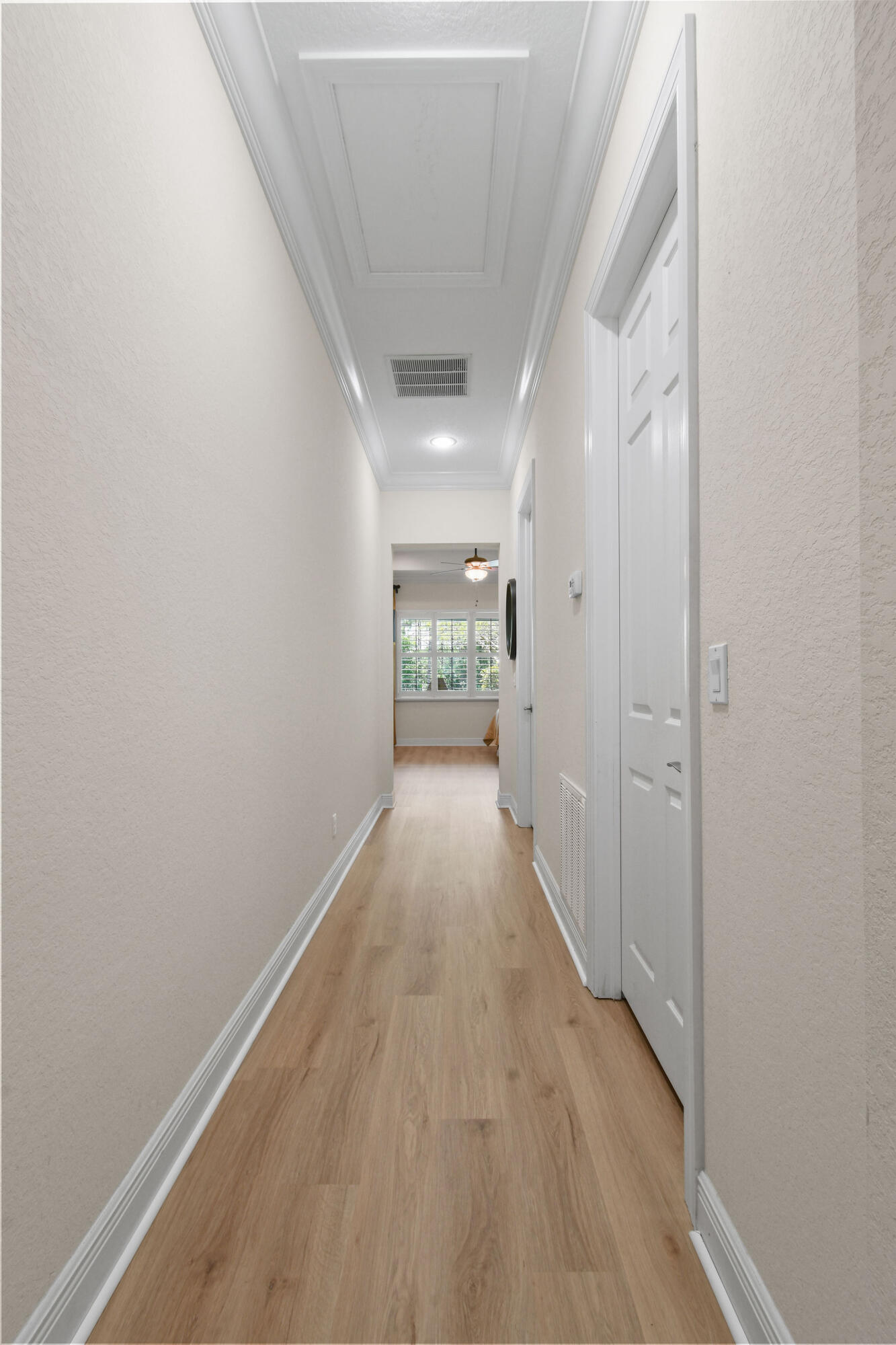 7668 Southeast Laque Circle Stuart, FL 34997 - Photo 26 of 64 Hallway to Master Bedroom