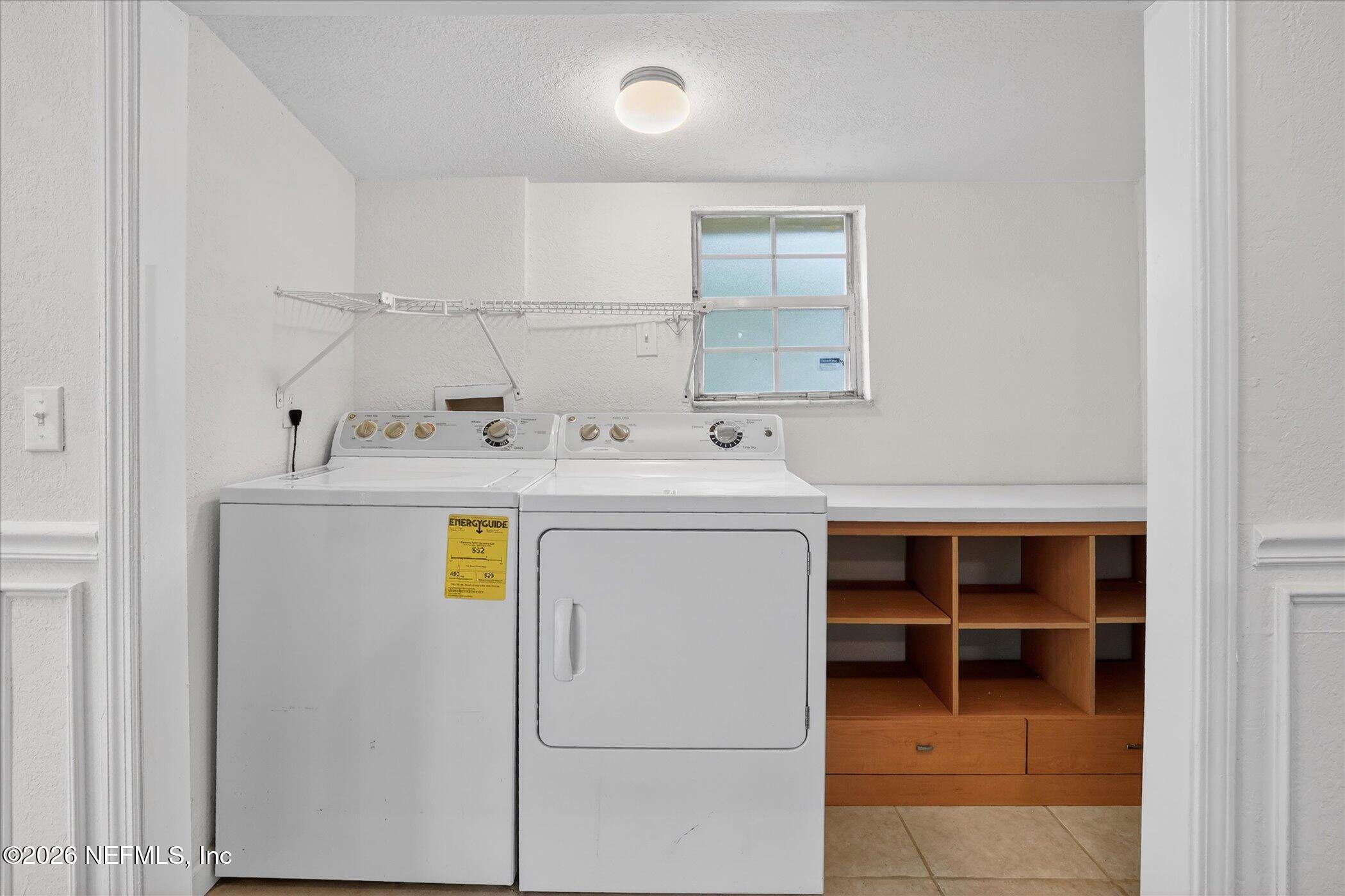 1217 Cook Street Jacksonville, FL 32205 - Photo 12 of 43 a utility room with dryer and washer