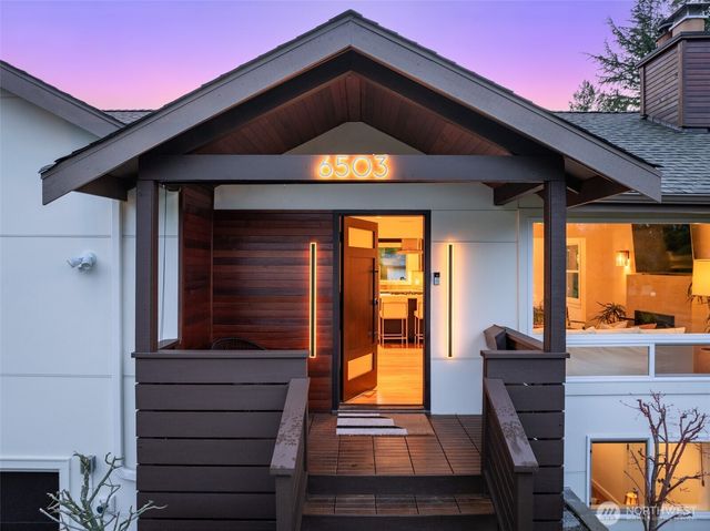 a front view of a house with a porch