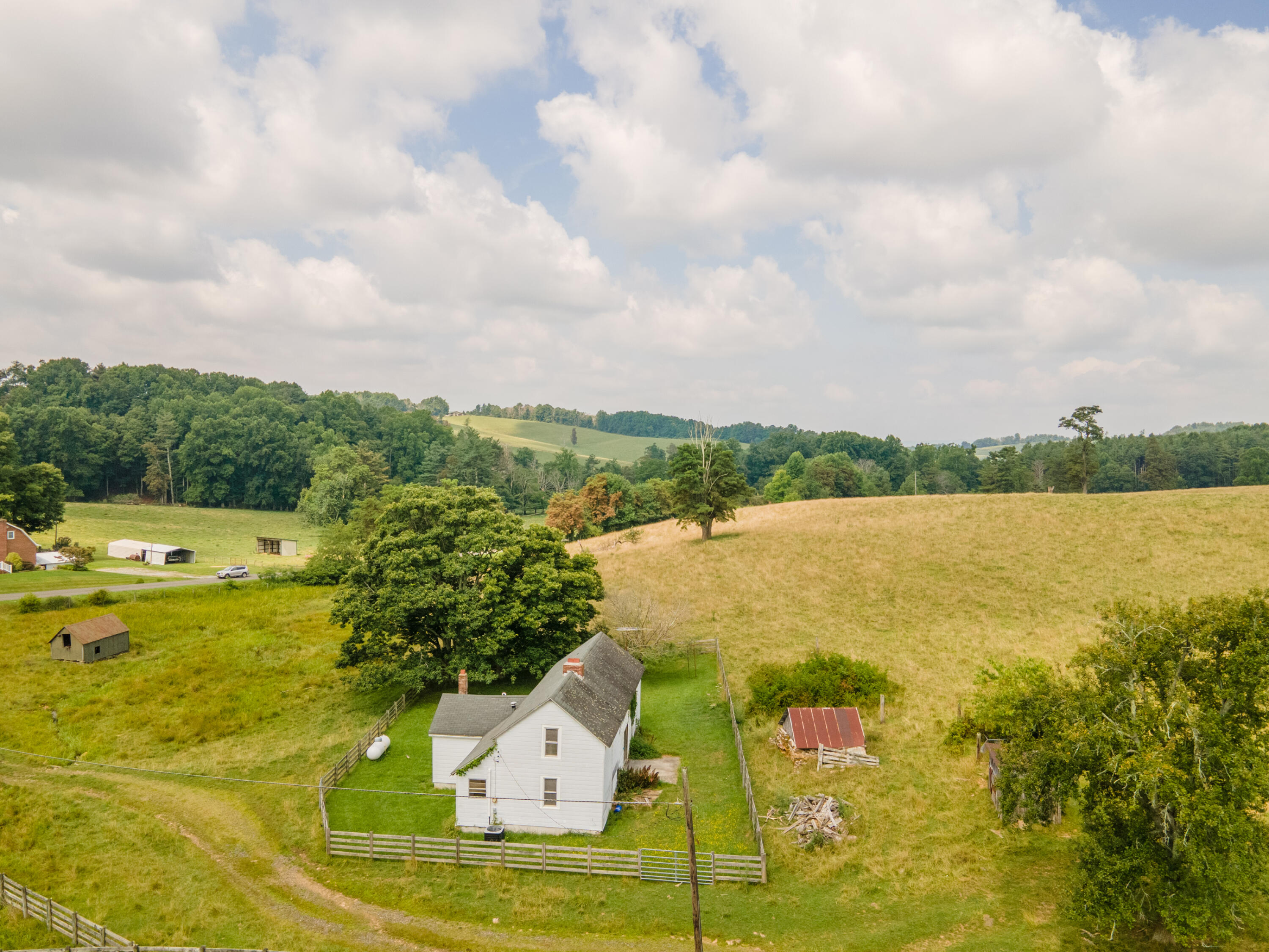 767 Kyle Weeks Road Southwest Willis, VA 24380 - Photo 4 of 86 a view of a lake with a big yard