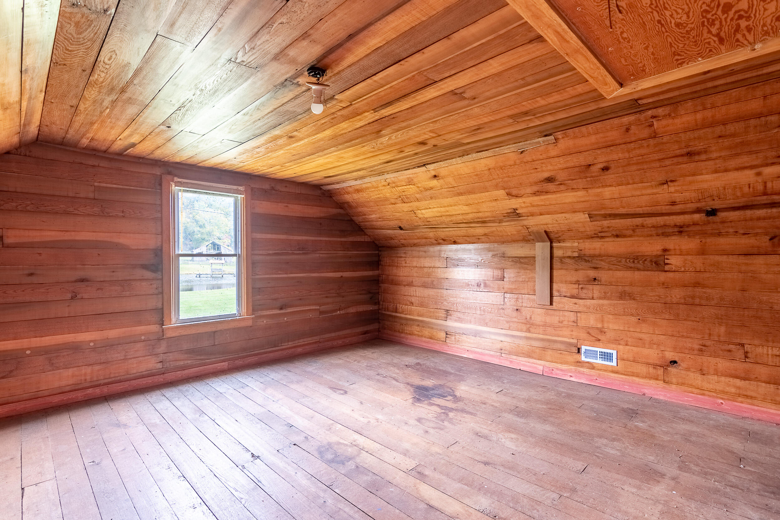 767 Kyle Weeks Road Southwest Willis, VA 24380 - Photo 54 of 86 a view of empty room with wooden floor