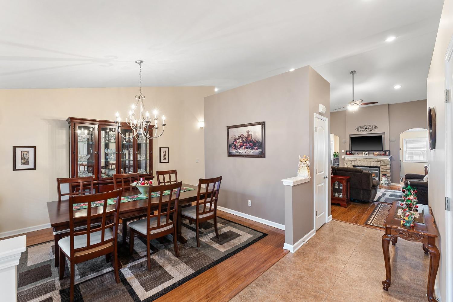 10331 Nelson Street Crown Point, IN 46307 - Photo 11 of 47 a view of a dining room with furniture and chandelier