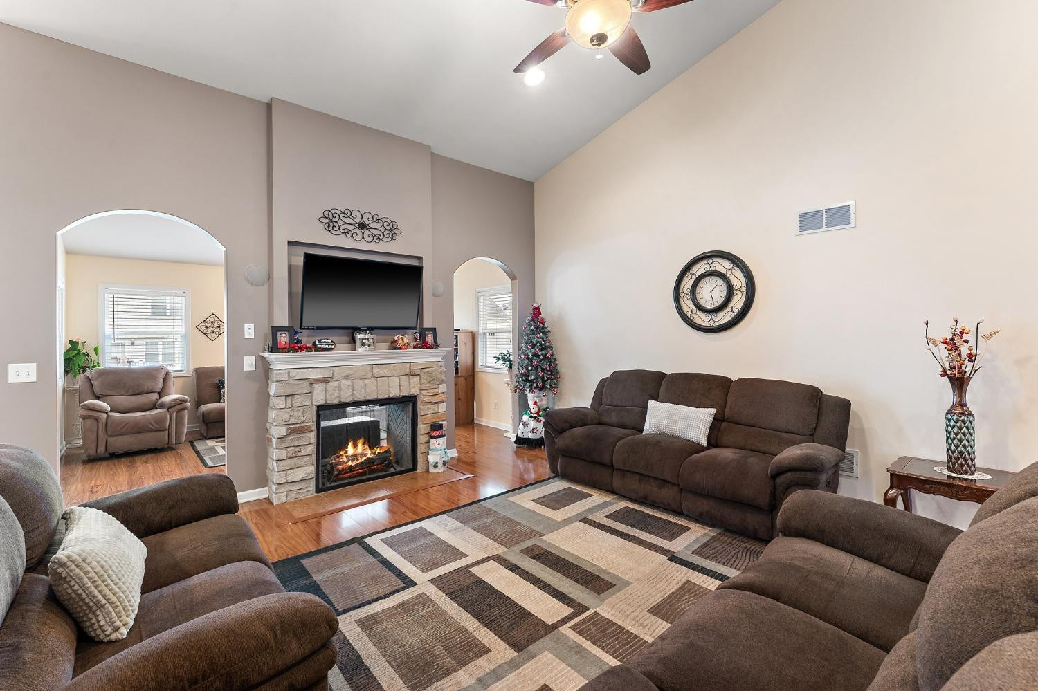 10331 Nelson Street Crown Point, IN 46307 - Photo 15 of 47 a living room with furniture and a fireplace