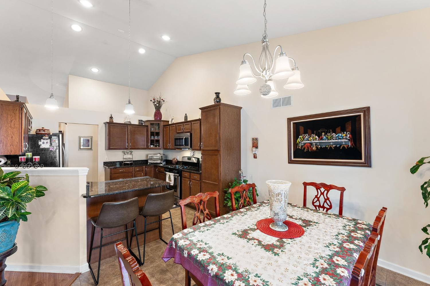 10331 Nelson Street Crown Point, IN 46307 - Photo 21 of 47 a view of a dining room with furniture