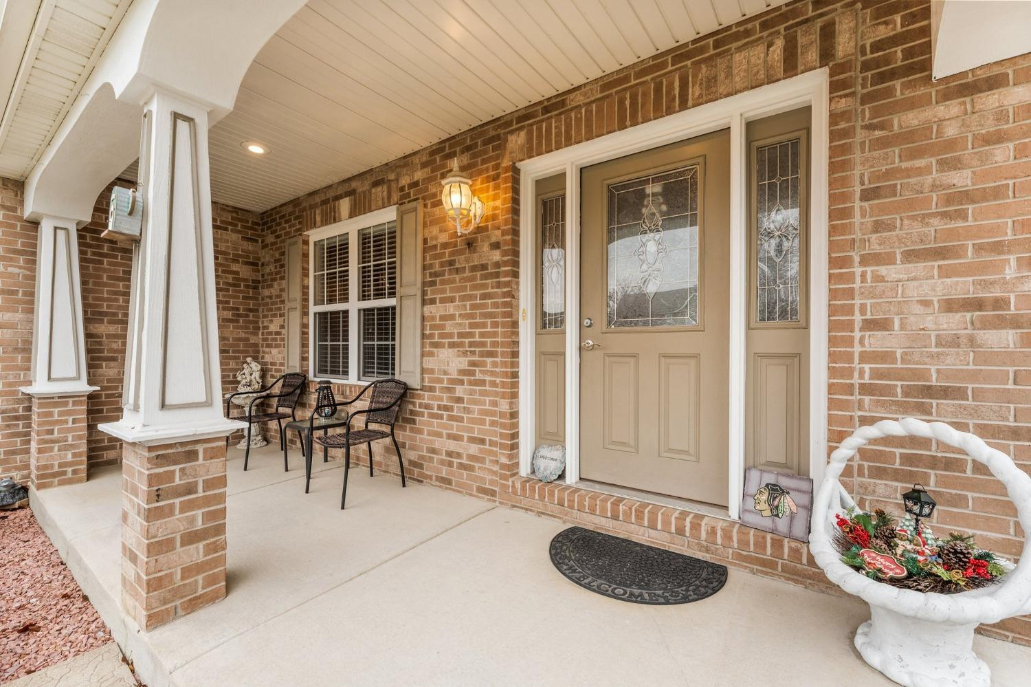 10331 Nelson Street Crown Point, IN 46307 - Photo 7 of 47 a view of a patio with table and chairs