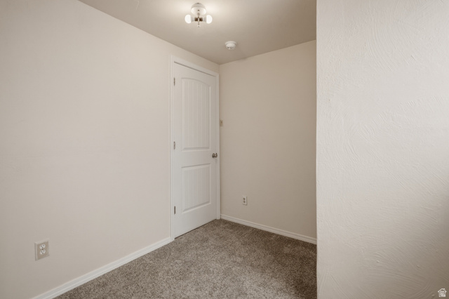 337 North Main Street Central Valley, UT 84754 - Photo 36 of 40 Unfurnished room featuring light colored carpet and baseboards