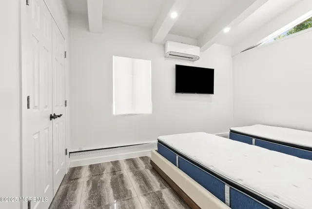 a view of kitchen and utility room with wooden floor