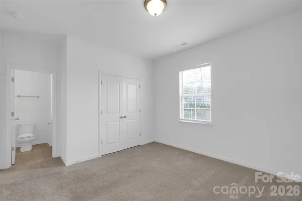 a view of a room that has a window in it