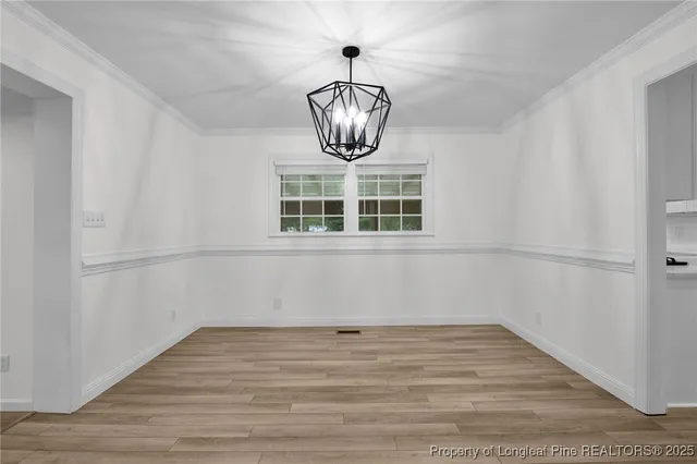 a view of a room with a chandelier