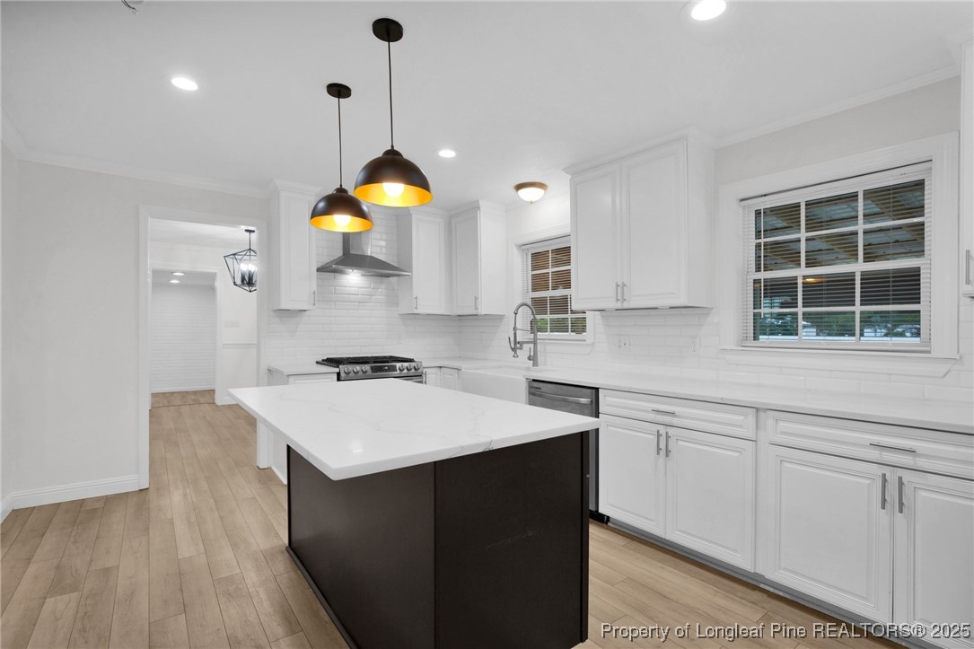 309 Cornith Road Pembroke, NC 28372 - Photo 14 of 40 a kitchen with a sink and a stove top oven