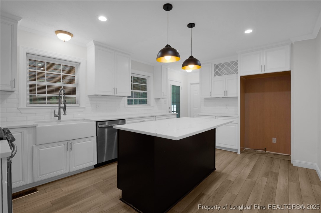 309 Cornith Road Pembroke, NC 28372 - Photo 15 of 40 a kitchen with a sink a counter space appliances and cabinets