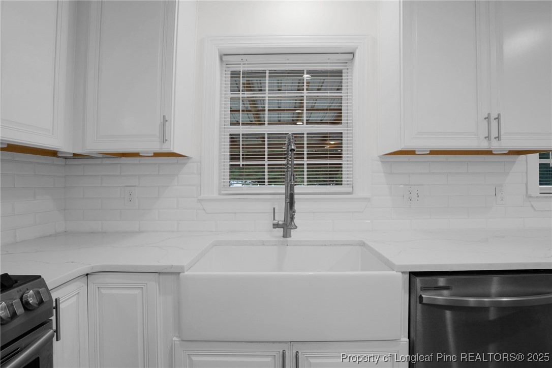 309 Cornith Road Pembroke, NC 28372 - Photo 17 of 40 a bathroom with a sink and a bathtub