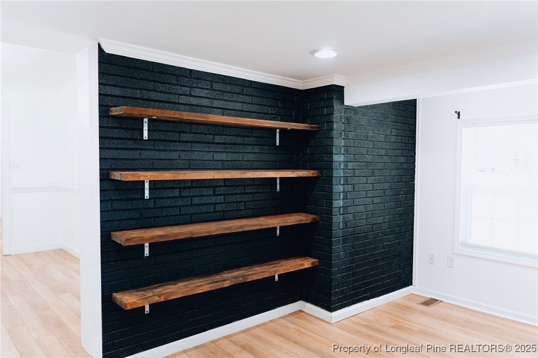 309 Cornith Road Pembroke, NC 28372 - Photo 19 of 40 a view of bedroom and wooden floor