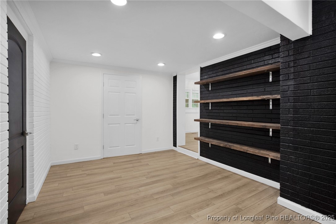 309 Cornith Road Pembroke, NC 28372 - Photo 20 of 40 a view of room with wooden floor