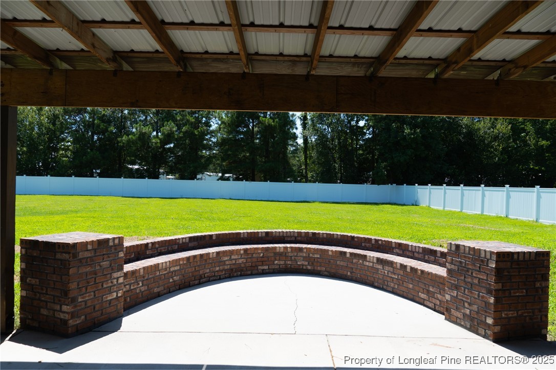 309 Cornith Road Pembroke, NC 28372 - Photo 34 of 40 a view of a swimming pool with a yard