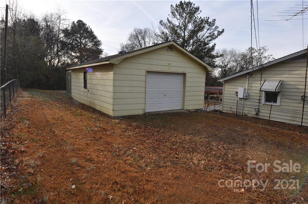 1234 Saluda Road Chester, SC 29706 - Photo 2 of 19 a view of a house with a yard and garage
