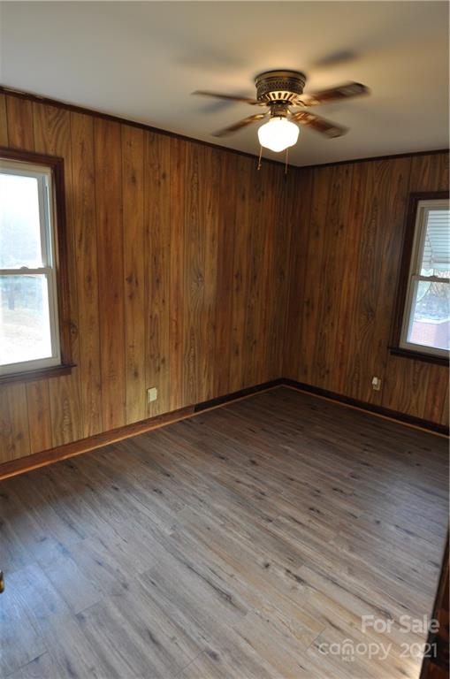 1234 Saluda Road Chester, SC 29706 - Photo 16 of 19 an empty room with wooden floor and windows