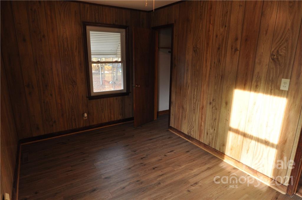 1234 Saluda Road Chester, SC 29706 - Photo 17 of 19 a view of an empty room with wooden floor and a window