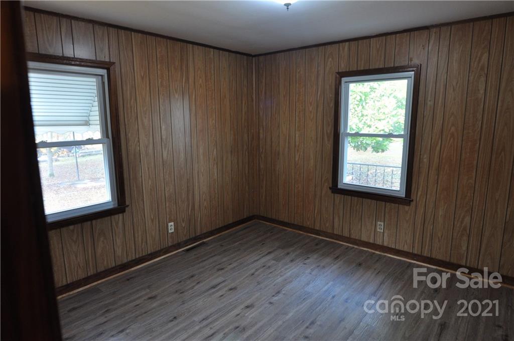 1234 Saluda Road Chester, SC 29706 - Photo 19 of 19 an empty room with wooden floor and windows