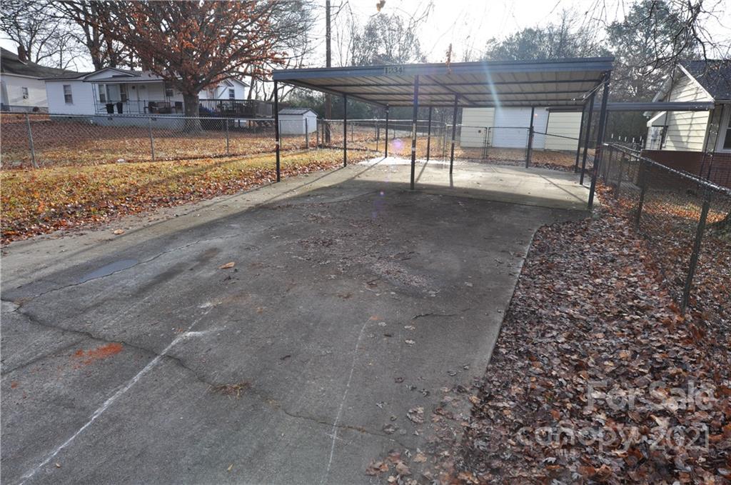 1234 Saluda Road Chester, SC 29706 - Photo 7 of 19 a view of a yard with wooden fence