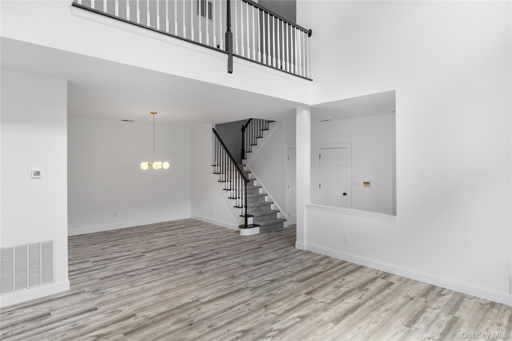 132 Benefield Boulevard Peekskill, NY 10566 - Photo 7 of 28 dining area with loft view