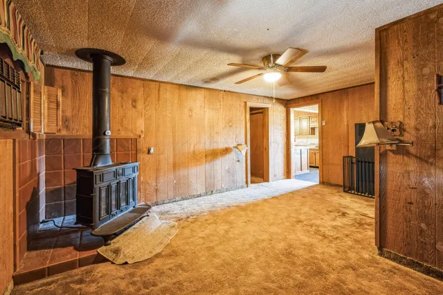 a bathroom with a toilet a sink and shower
