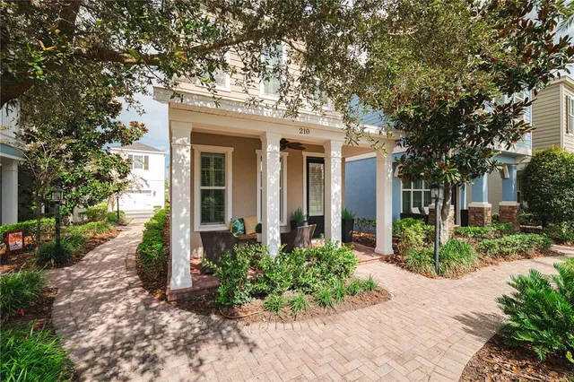 front view of a house with a small yard