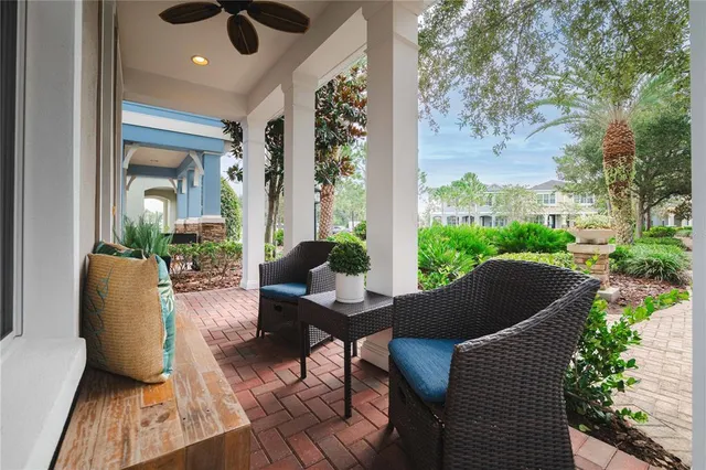 a balcony view with a seating space