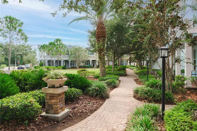 a view of a garden with a fountain