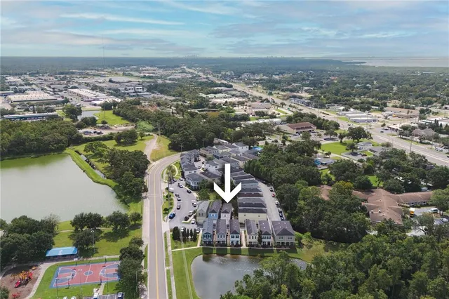 an aerial view of a house with a garden