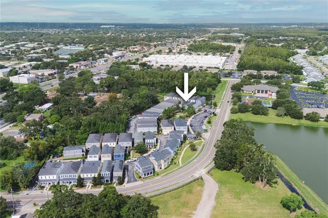 an aerial view of a house with outdoor space