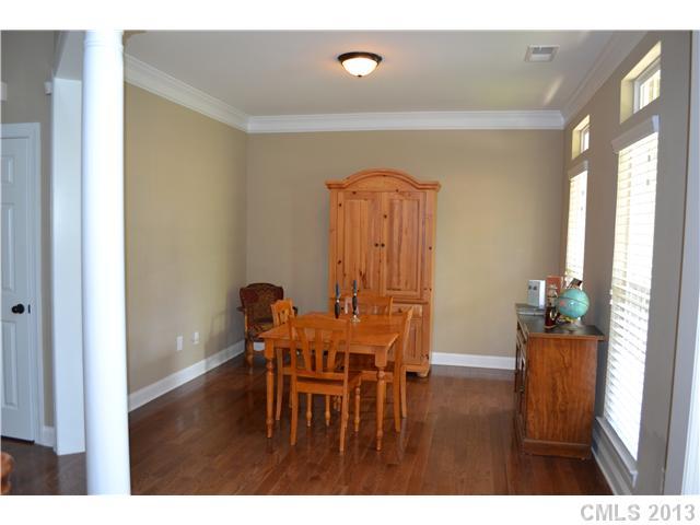 1917 Faison Avenue Fort Mill, SC 29708 - Photo 3 of 16 a view of a dining room with furniture and wooden floor