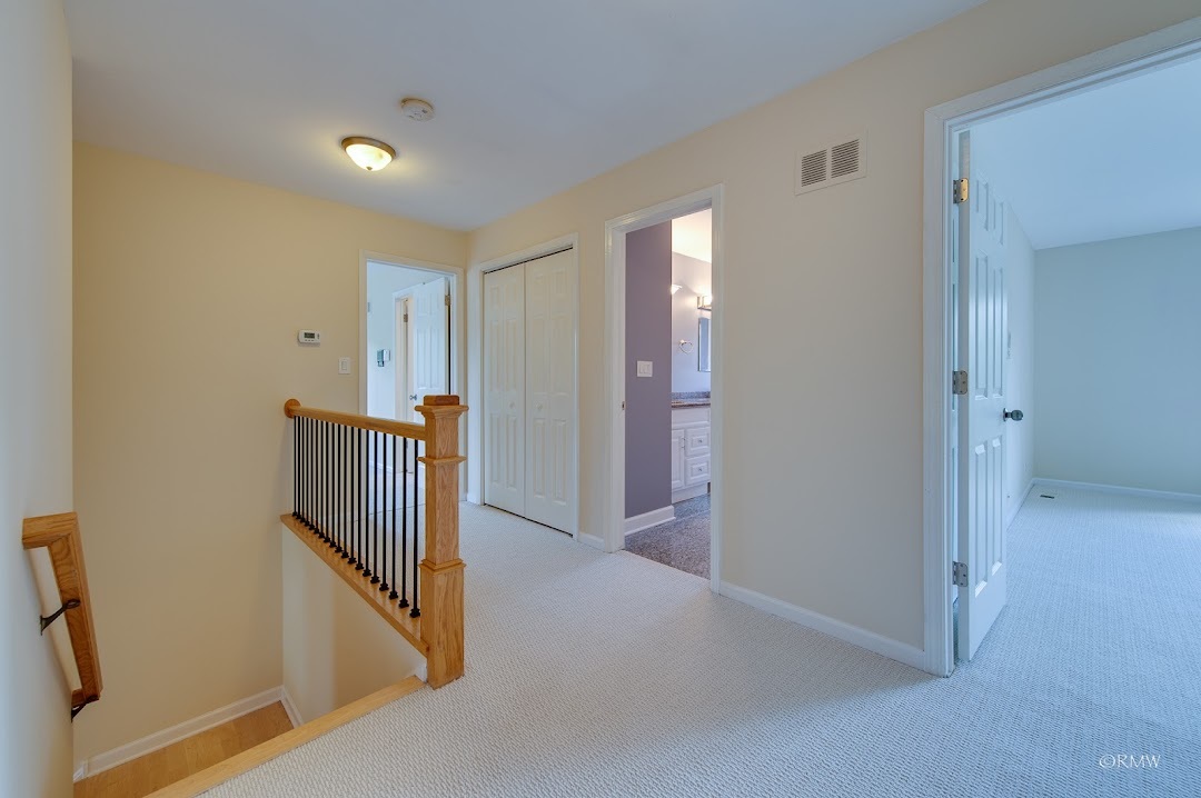 769 Halbert Lane Inverness, IL 60010 - Photo 19 of 48 a view of a hallway with staircase