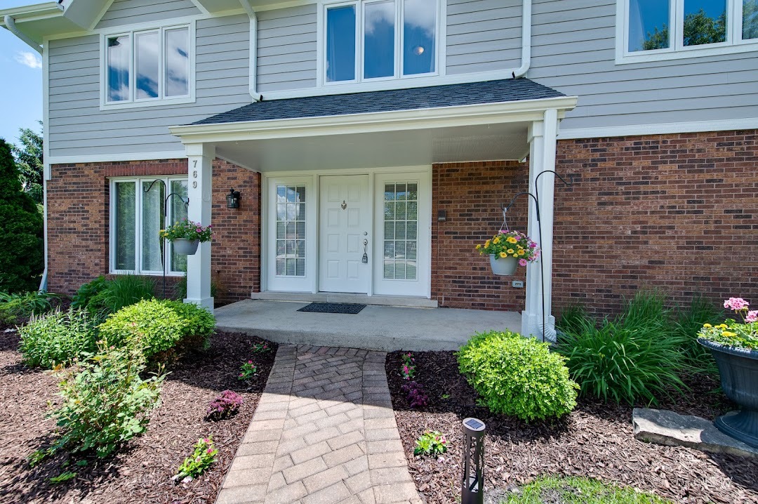 769 Halbert Lane Inverness, IL 60010 - Photo 3 of 48 a front view of a house